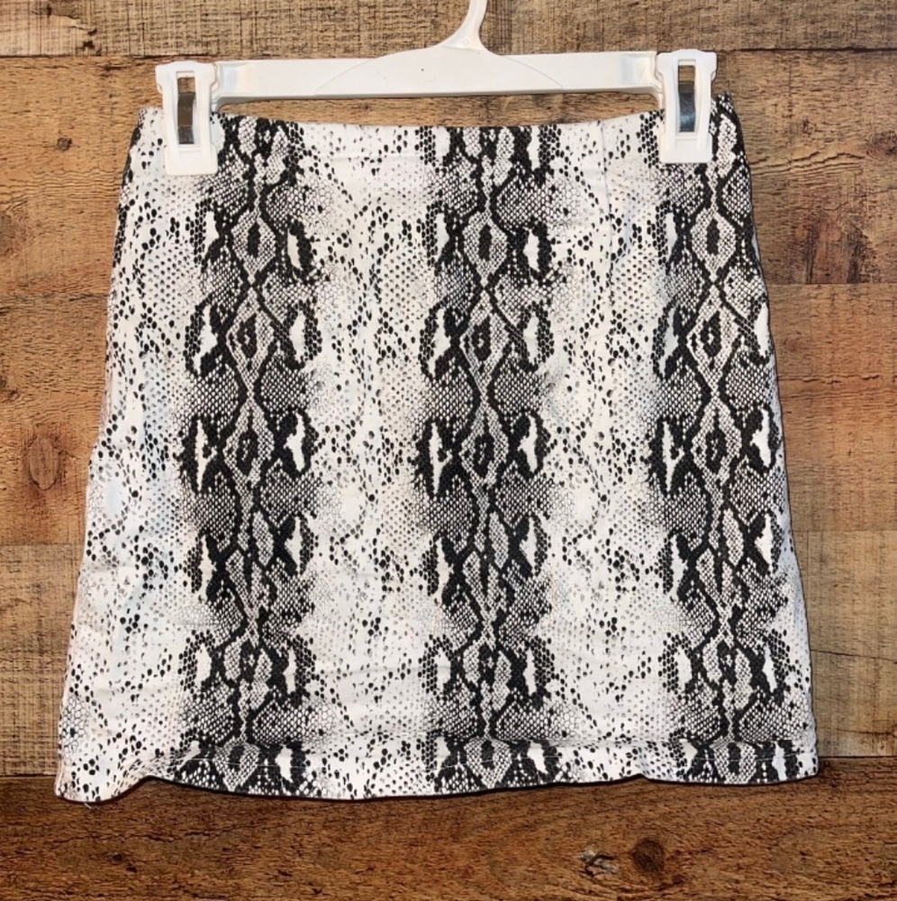 SOLD She & Sky snake print mini skirt